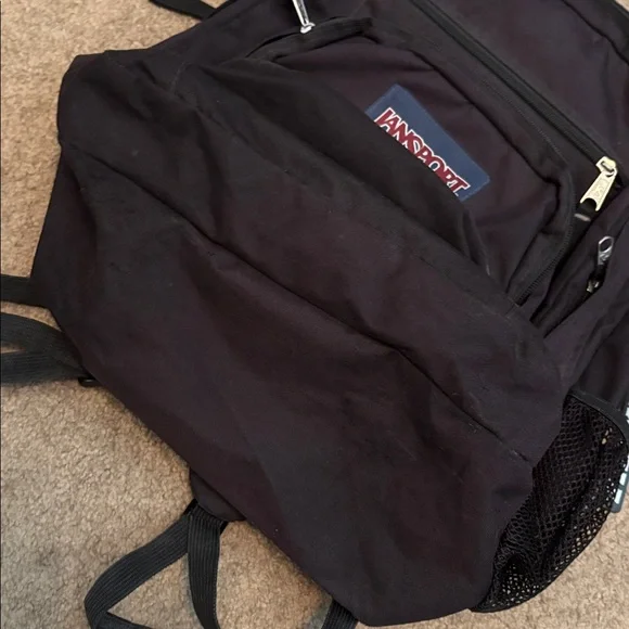 Jansport Dark Backpack with Multiple Pockets - Picture 2 of 2